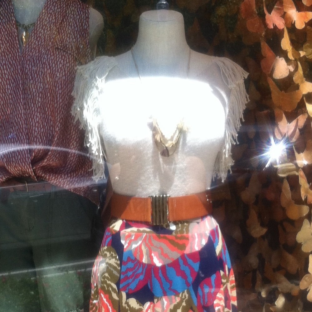ISO Anthropologie fringe top.